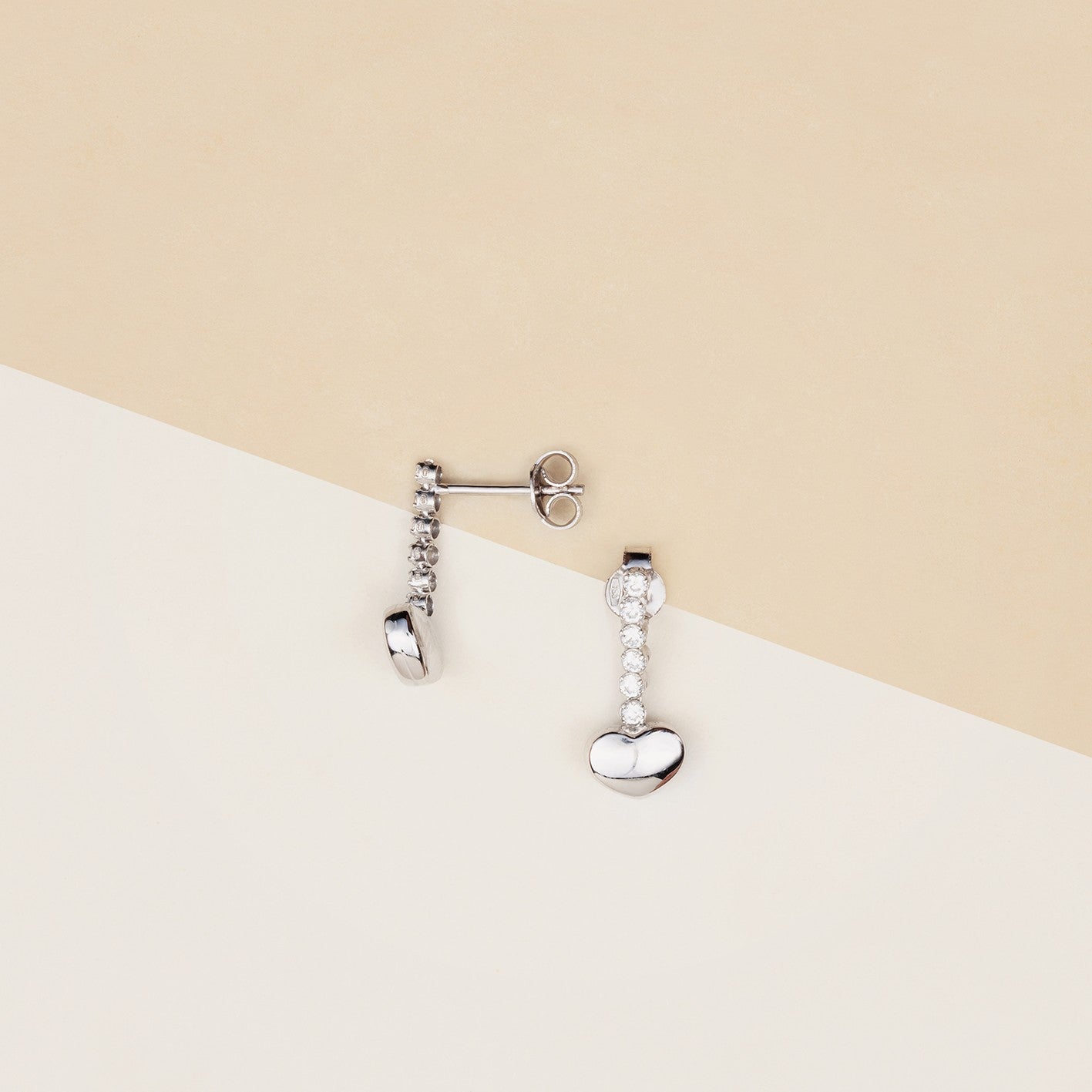 Orecchini tennis cuore pendente