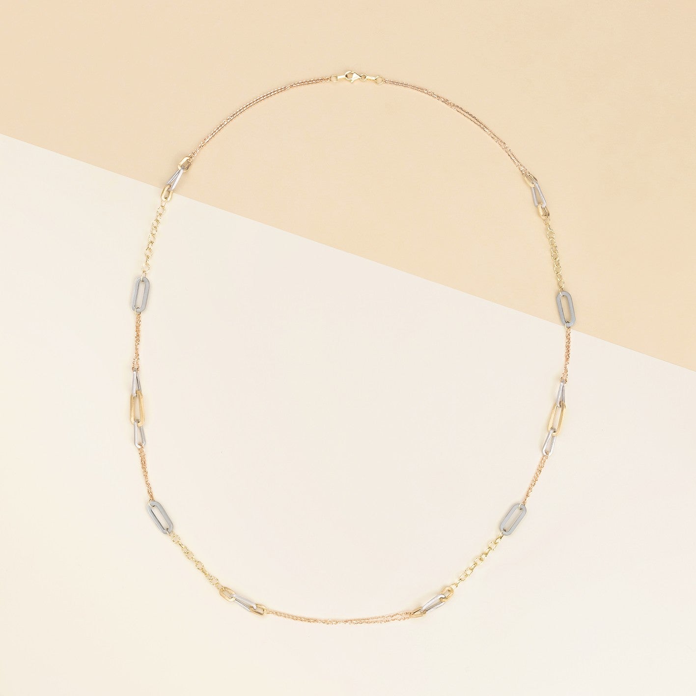 Collana lunga con ovali nei tre colori d'oro