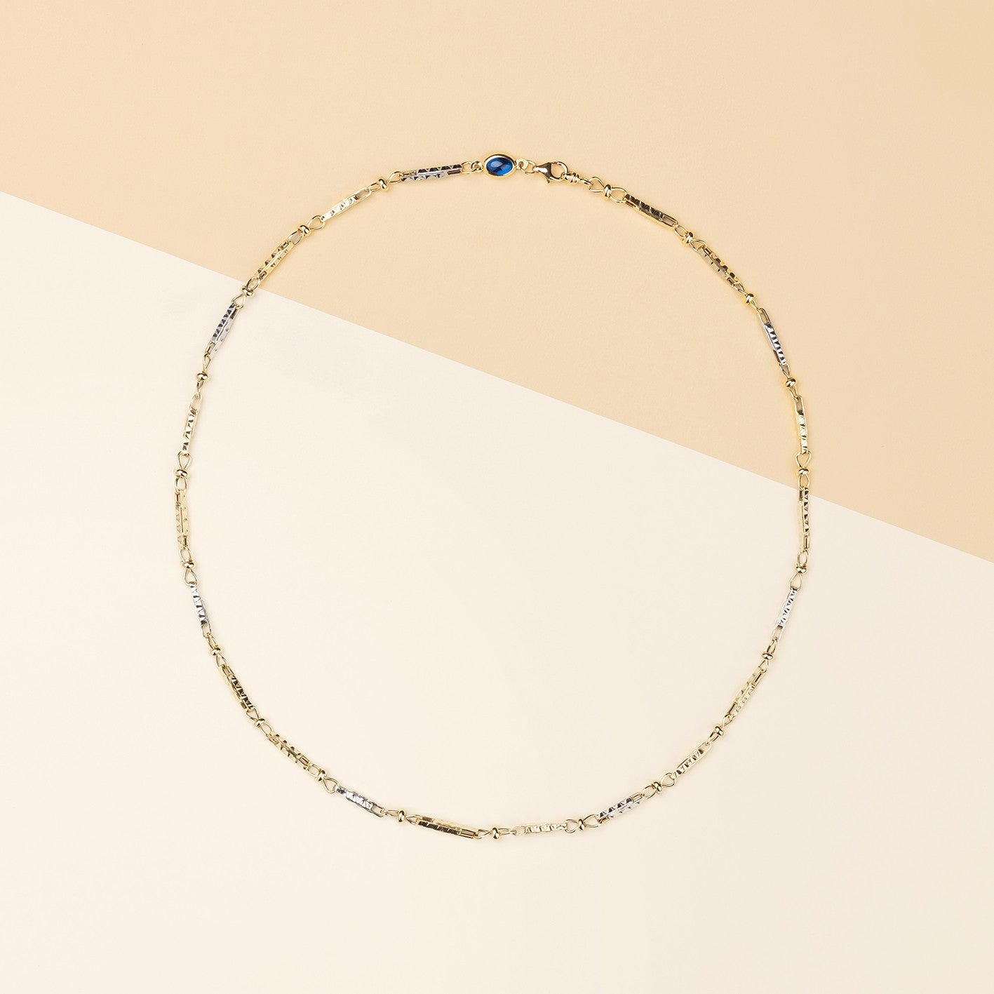 Catena bicolore con Cabochon blu