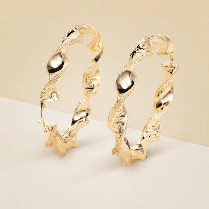 Orecchini cerchio Torchon con greca