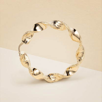 Orecchini cerchio Torchon con greca