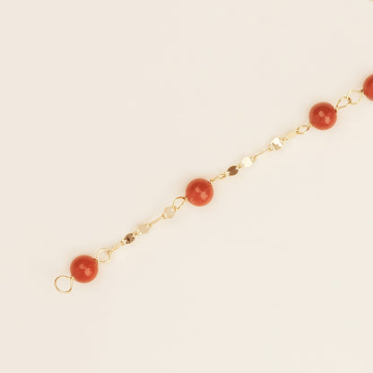 Bracciale baby con corallo rosso e targa oro giallo