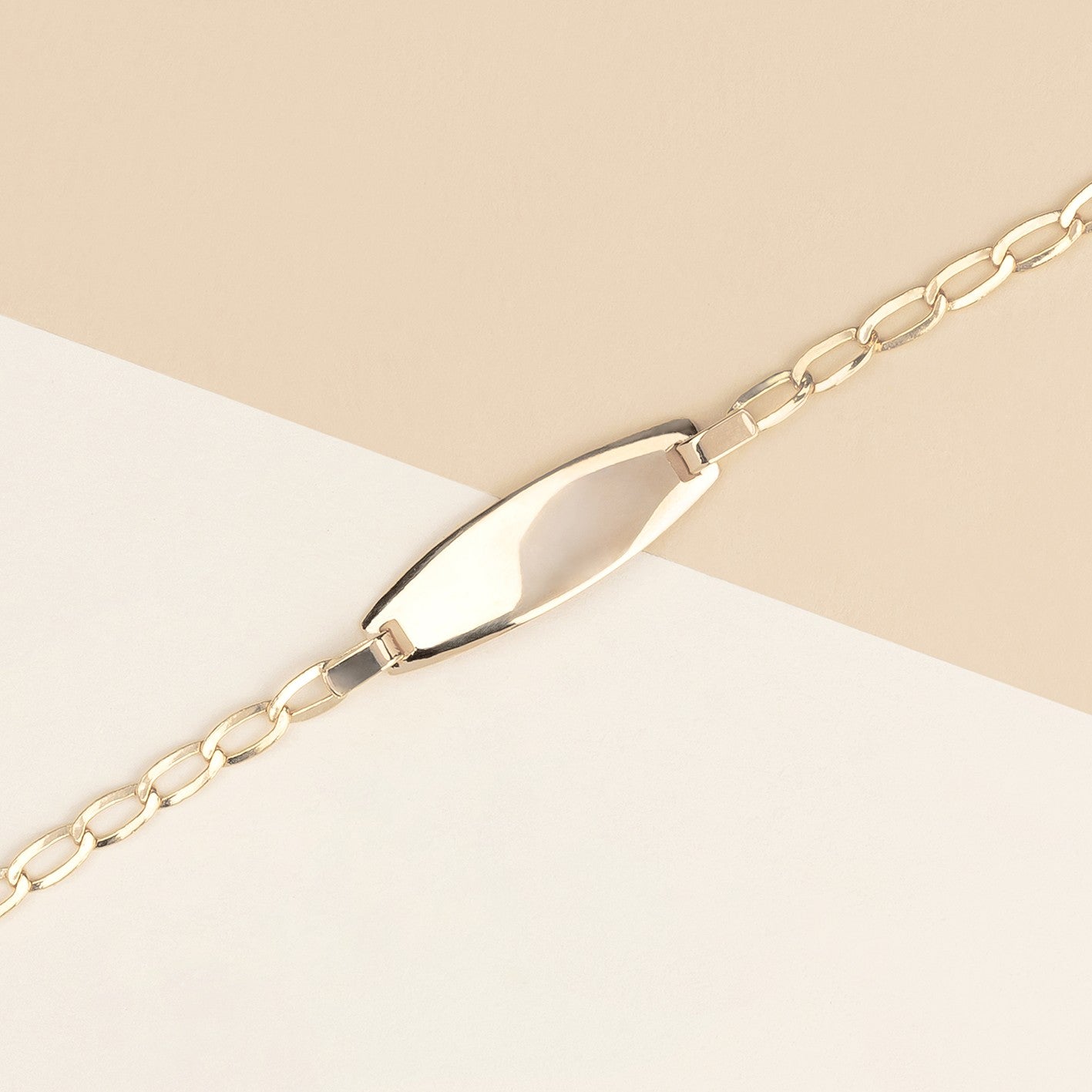 Bracciale baby con targa 1.1 oro giallo