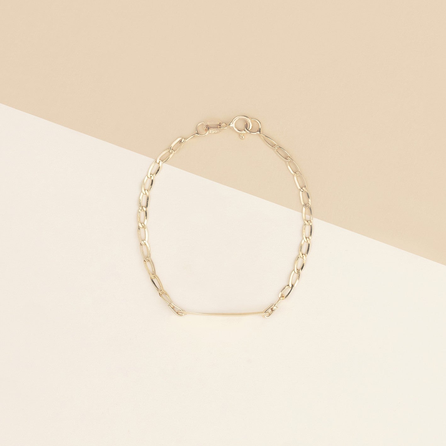 Bracciale baby con targa 1.1 oro giallo