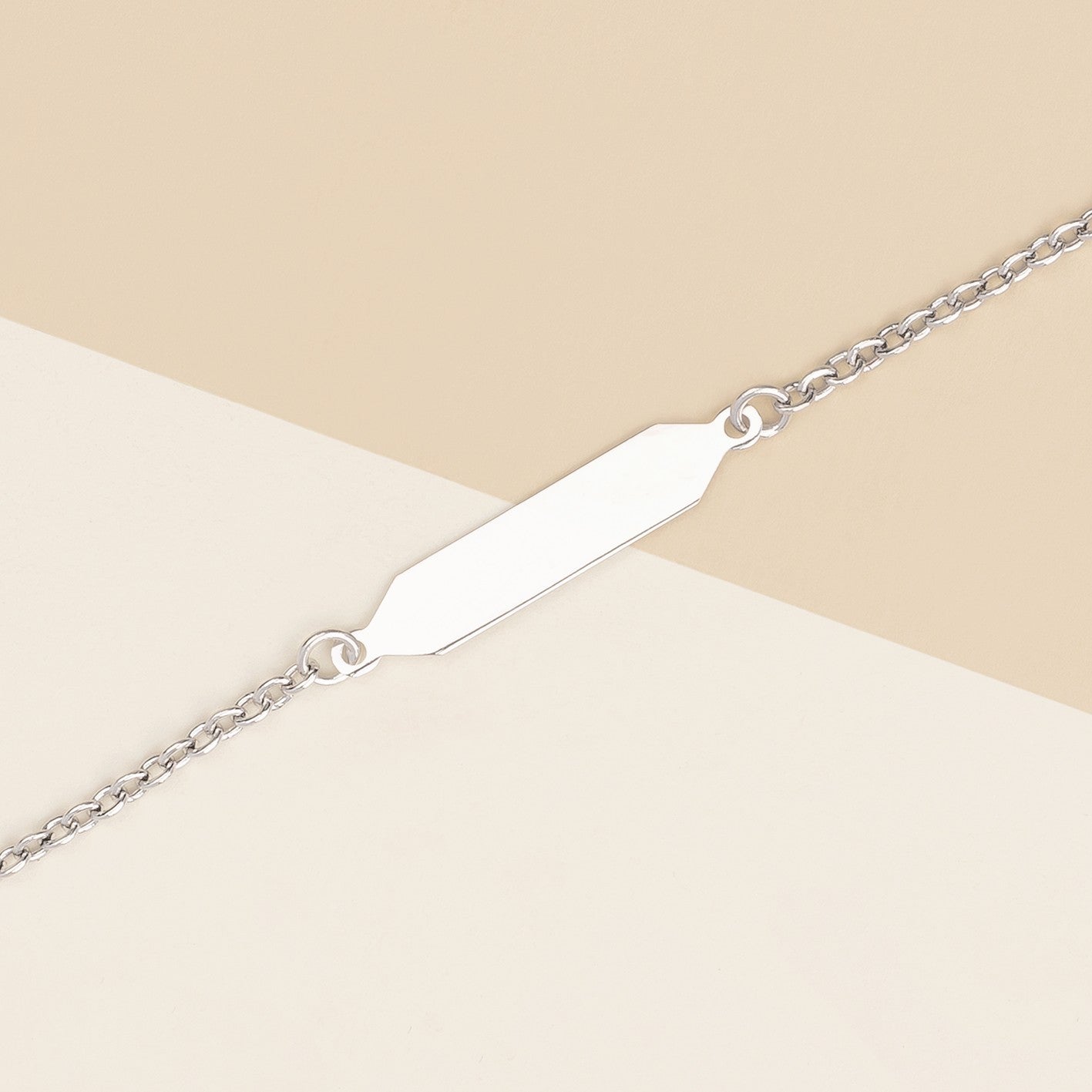 Bracciale baby con targa oro bianco 1.10